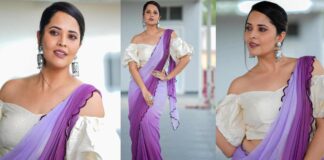 Anasuya shining in purple saree