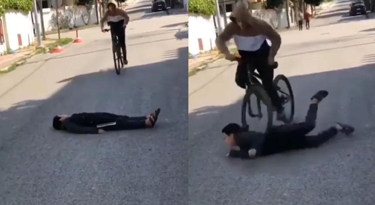 man lying on road hit by bicycle video viral