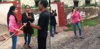 woman beats society security guard in agra in up