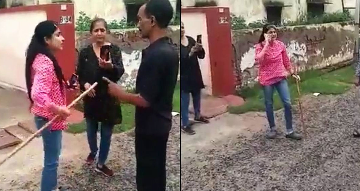 woman beats society security guard in agra in up