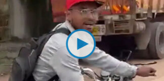 man performs stunt on moving bike video viral